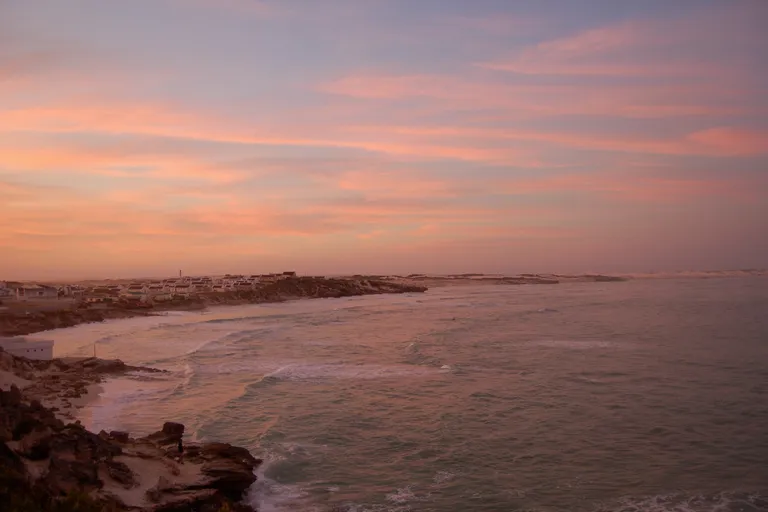 Whitewashed Arniston fishing village beside the Cape coast in South Africa