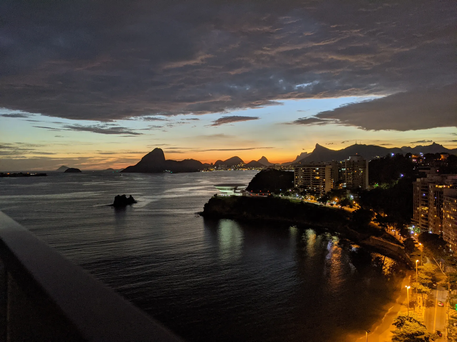 Sunset over Guanabara Bay with Sugarloaf Mountain and the Rio de Janeiro skyline in silhouette