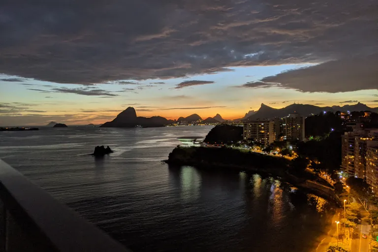 Sunset over Guanabara Bay with Sugarloaf Mountain and the Rio de Janeiro skyline in silhouette