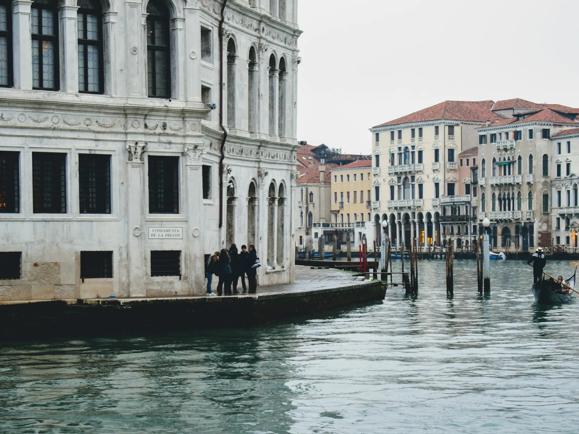Venice canal and historic waterfront architecture in Italy