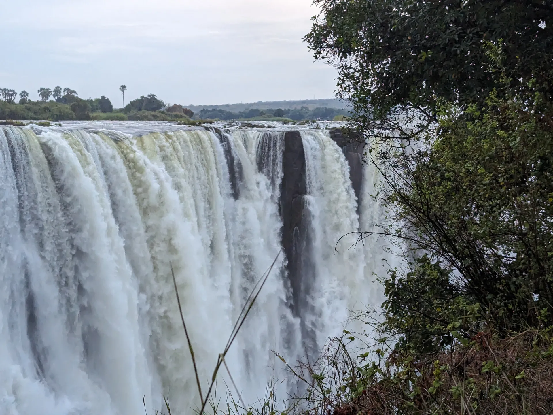 Victoria Falls dropping into the Zambezi Gorge between Zambia and Zimbabwe