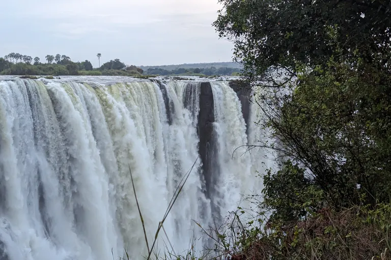 Victoria Falls dropping into the Zambezi Gorge between Zambia and Zimbabwe