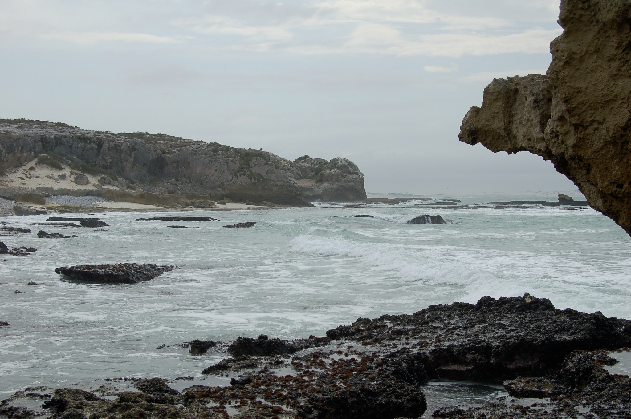 Rocky shoreline and turquoise water at Arniston