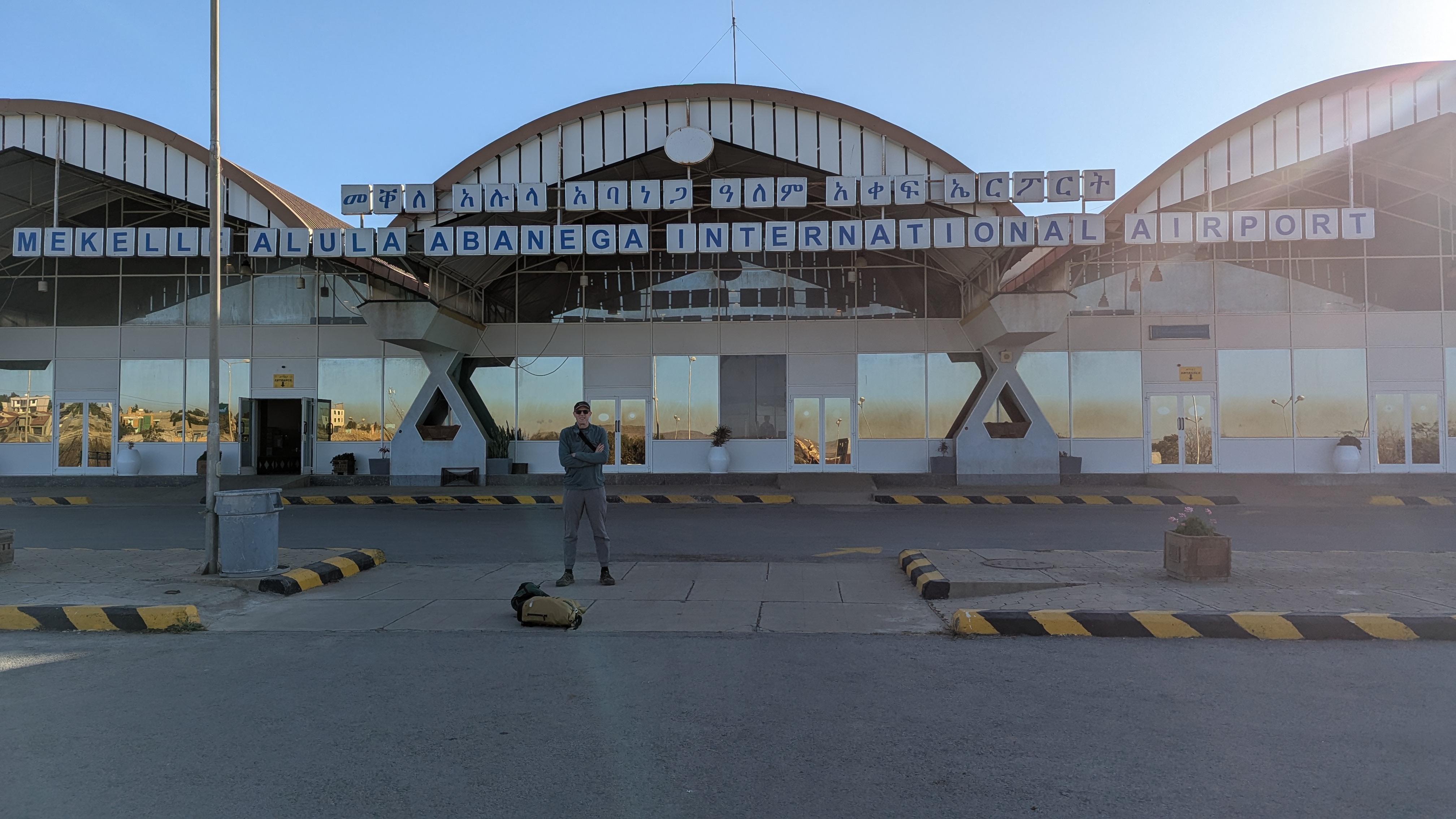 Traveller standing in front of Mekelle Alula Aba Nega International Airport in Ethiopia