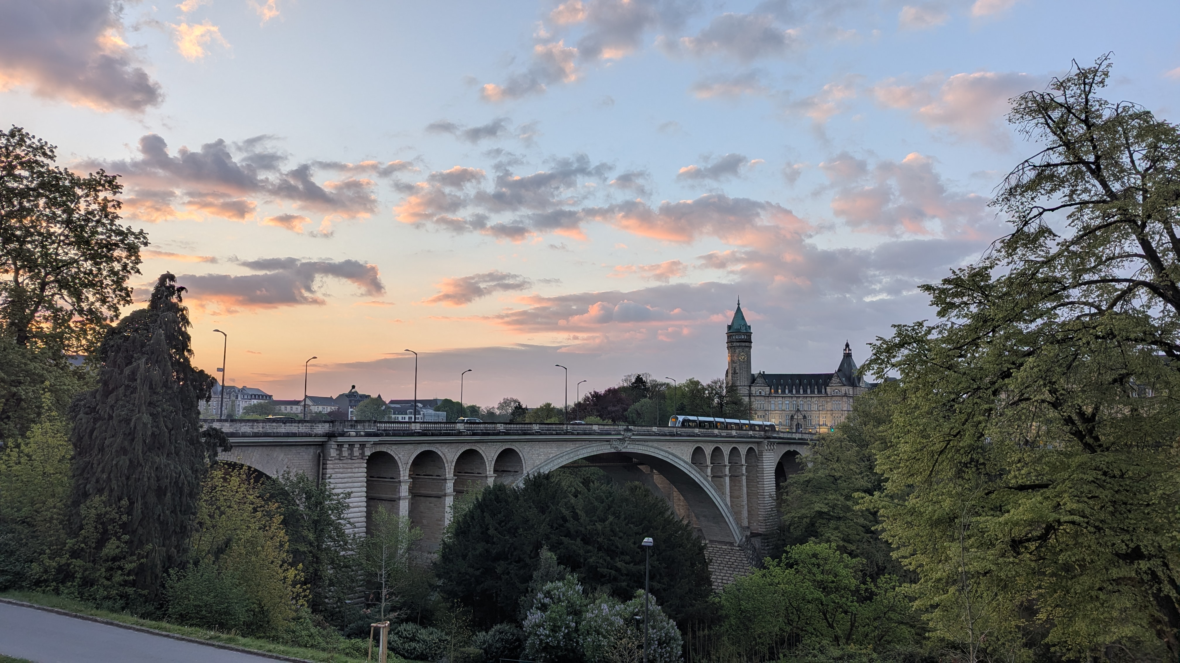 View over Luxembourg City's old quarter with sandstone cliffs, the Alzette river, and historic buildings