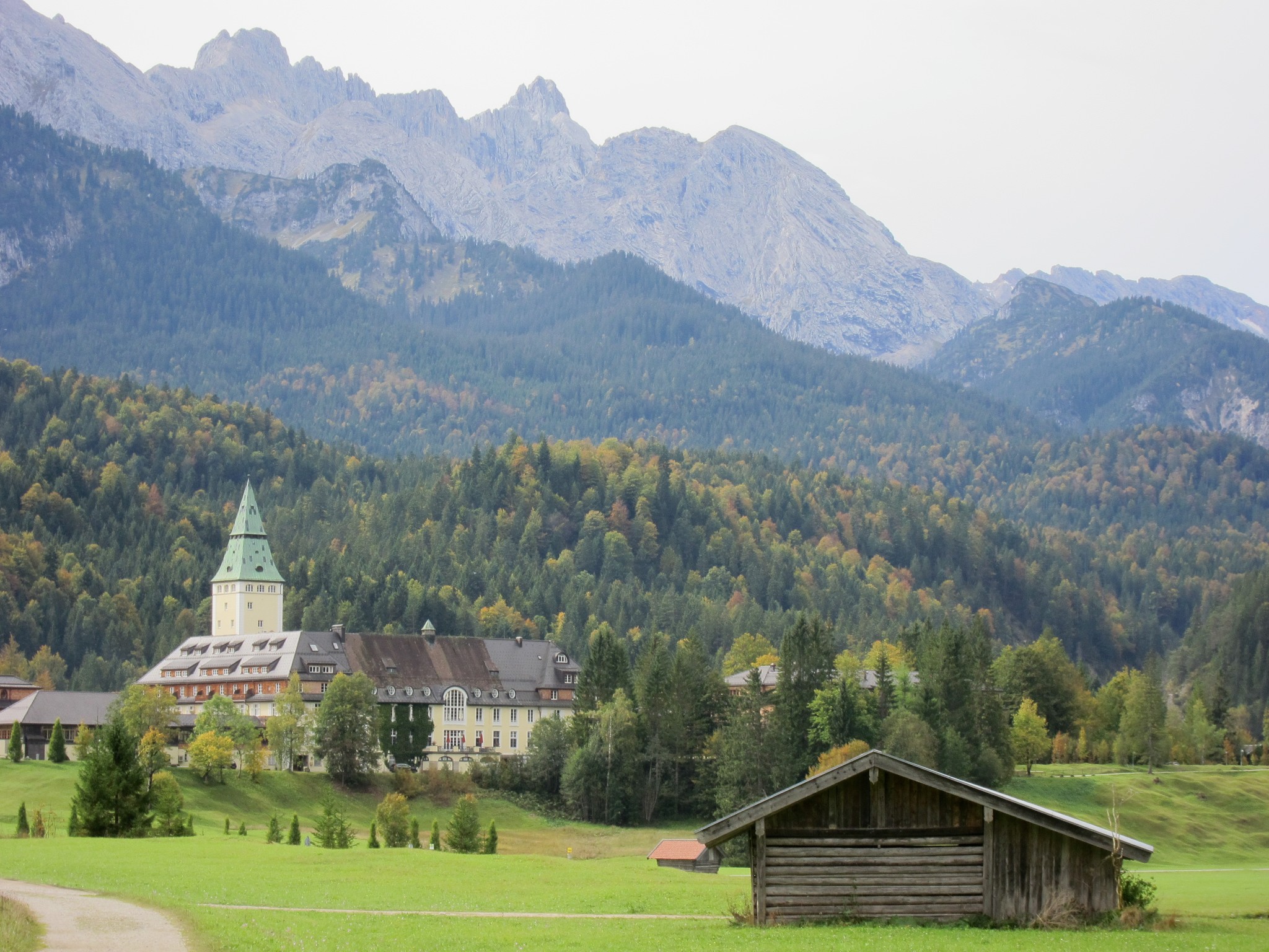 Church tower and Alpine foothills below the Karwendel mountains near Mittenwald